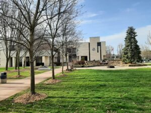 Picture of Niagara Falls City Hall with green grass and trees in the forefront