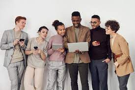 Group of people looking at computer