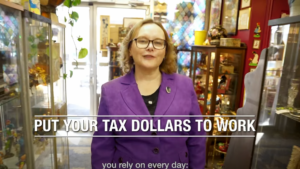 Lori Lococo Talking in a Store